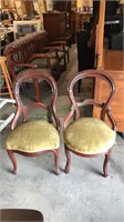 Pair of walnut open back Victorian side chairs,