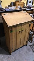 Pine two door cabinet with a lift top, 37 x 24 x