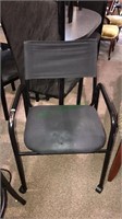 Metal arm chair on wheels, (672)