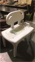 All plastic shower or bath chair with adjustable