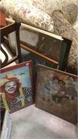 Seven clown prints and most of them are framed