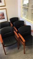 (5) black leather and mahogany conference chairs