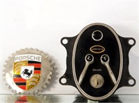 Vintage Lincoln Delco starter and Porsche emblem