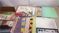 Assorted scrap booking paper and other craft