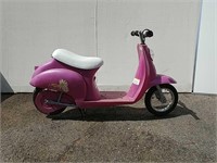 Pink children's moped