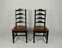Pair of black wood dining chairs