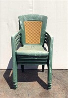 Four Green Plastic Patio Chairs