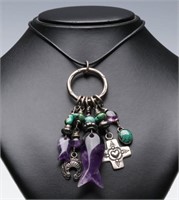 A STERLING, AMETHYST AND TURQUOISE CHARM NECKLACE