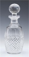 A CUT IRISH CRYSTAL DECANTER SIGNED WATERFORD
