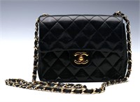 A CLASSIC CHANEL SMALL QUILTED BLACK PURSE