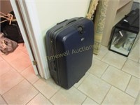 Oversized Samsonite suitcase