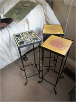 Three wrought iron accent tables