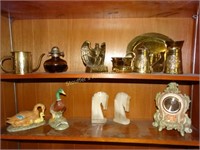 2-shelves in basement: horse bookents, brass