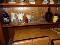 Shelf of assorted glassware: ginger jar, pitchers
