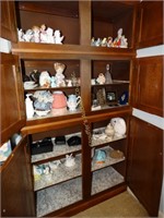 Contents of 6 shelves: ceramic angels, bunnies,