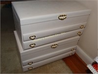 2 white jewelry boxes