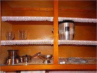Contents of 2 upper cabinets: stainless flour