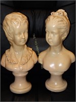 Pair of boy & girl statues