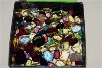 GROUP OF 75+ MIXED GEMSTONES IN VARIOUS SIZES