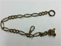 GOLD PLATED WATCH CHAIN W/  DECORATIVE FOB