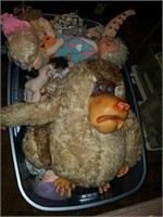 Large tote full of stuffed animals and dolls