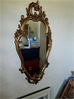 Very cool vintage gold plaster wall mirror.