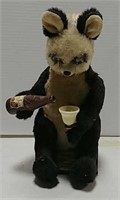 Toy drinking panda