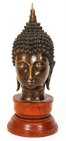 A 20TH CENTURY BRONZE HEAD OF BUDDHA