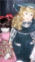 SET OF PORCELAIN DOLLS AND LARRY COKER BOBBLE HEAD