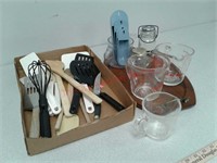 Kitchen utensils, wood spoons, glass measuring