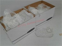 Several clear glass teardrop snack sets trays and
