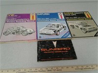 3 auto repair manuals and 1 owner's manual - 70 -
