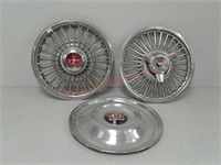 3 Ford Mustang and other vintage hubcaps