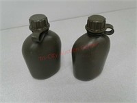 2 green military plastic water bottles