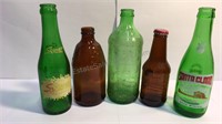 5 vintage green and glass bottles. Santa Clara