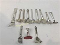 TWELVE ASSORTED PIECES OF STERLING SILVER