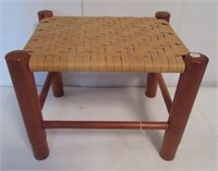 Rustic stool with woven top. Measures 12" h x 14"