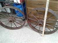 2 antique cast iron wagon wheels