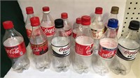Lot of 12 Mixed Coca-Cola Plastic Bottles, empty