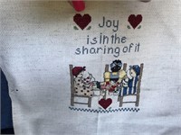 Cross Stitched "Joy  is in the sharing of it"