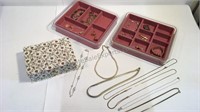 Assorted jewelry with velvet separators and