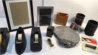 Assorted desktop items. Tape dispensers, picture