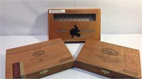 Three wooden cigar boxes