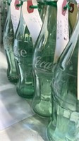 4 -   Green w/Wht Logo Coca-Cola 6.5oz Bottles