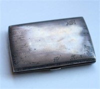 Sterling silver cigarette case, hinged example,