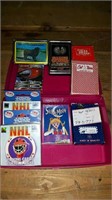 PLASTIC BOX WITH 9 DECKS OF SOUVENIR PLAYING CARDS