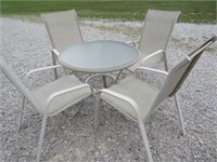 smaller patio table & 4 chairs set - used