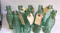 9  Green Raised Glass Coca-Cola 6 1/2 oz Bottles