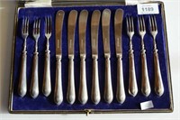 Set of sterling silver dessert knives & forks