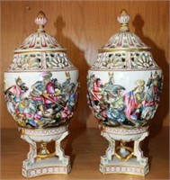 Pair of Italian Naples lidded vases,